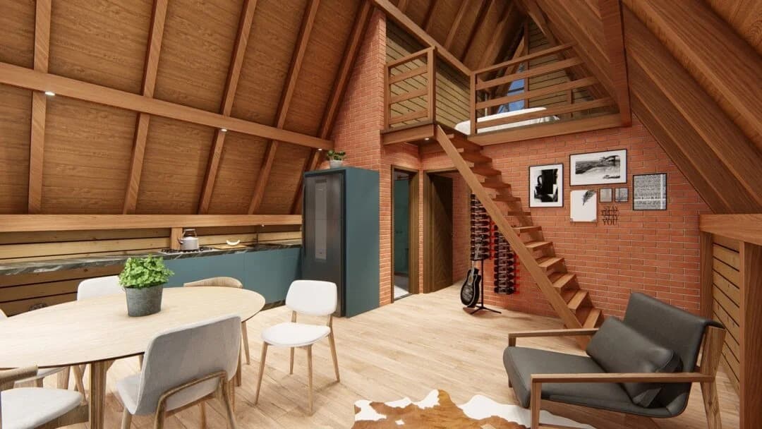 Interior de chalé com sala e cozinha integradas